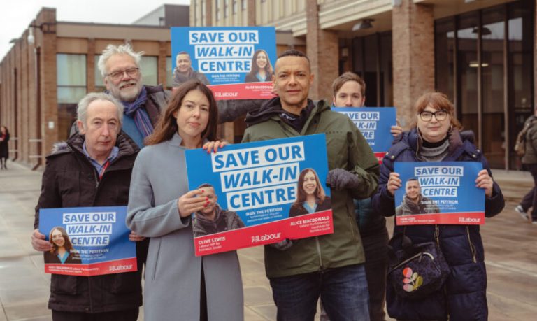 Alice Macdonald, Clive Lewis MP and local Labour councillors/activists at County Hall, holding up Save our Walk-in Centre posters